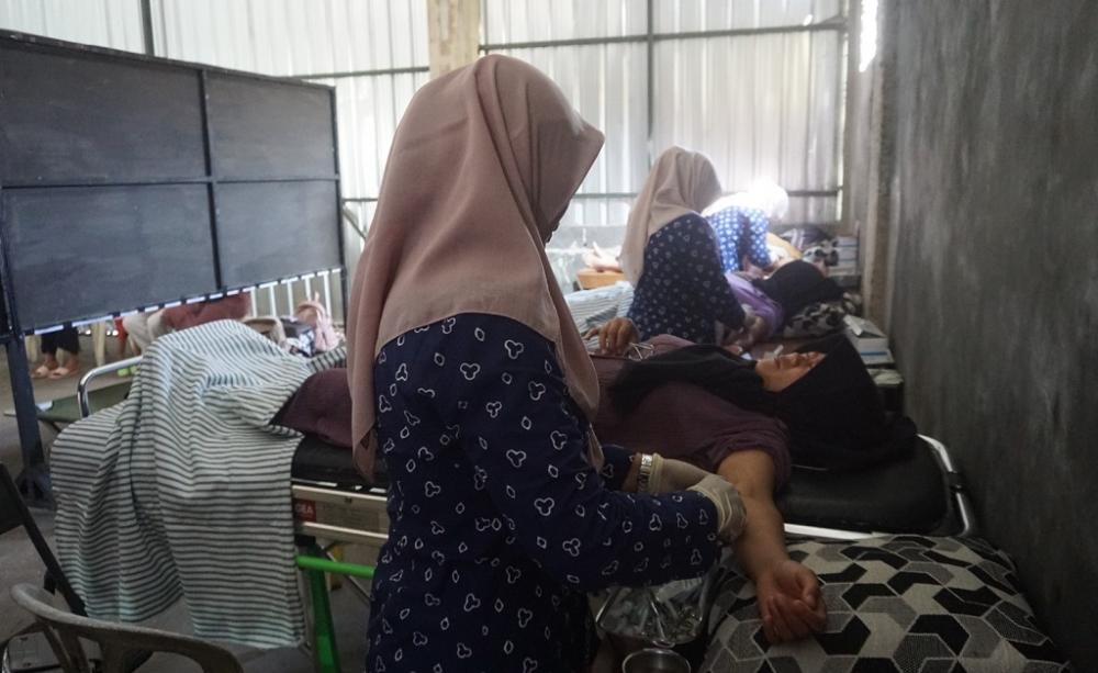 Upaya Peningkatan Kualitas Warga Pacet, Kodim Batang Berikan Layanan KB Gratis