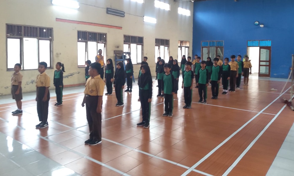 Tanamkan Disiplin Sejak Dini, Polisi Latih PBB Siswa Sekolah Dasar